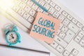 Handwriting text Global Sourcing. Concept meaning practice of sourcing from the global market for goods Empty copy space red note