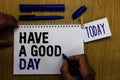 Handwriting text Have A Good Day. Concept meaning Nice gesture positive wishes Greeting Enjoy Be happy Man holding marker notebook Royalty Free Stock Photo