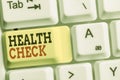Handwriting text Health Check. Concept meaning Medical Examination Wellness and general state Inspection White pc