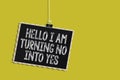 Handwriting text Hello I Am Turning No Into Yes. Concept meaning Persuasive Changing negative into positive Hanging blackboard mes