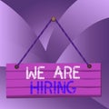 Handwriting text We Are Hiring. Concept meaning Workforce Wanted HR recruiting new hire employee Vacancy Wood plank nail