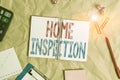 Handwriting text Home Inspection. Concept meaning noninvasive examination of the condition of a home Papercraft craft paper desk Royalty Free Stock Photo