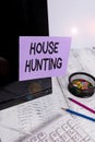 Handwriting text House Hunting. Concept meaning the act of searching or looking for a house to buy or rent Note paper taped to Royalty Free Stock Photo