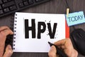 Handwriting text Hpv. Concept meaning Human Papillomavirus Infection Sexually Transmitted Disease Illness written by Man on Notepa Royalty Free Stock Photo