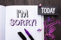 Handwriting text I m Sorry. Concept meaning Apologize Conscience Feel Regretful Apologetic Repentant Sorrowful written on Notebook Royalty Free Stock Photo