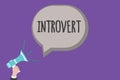 Handwriting text Introvert. Concept meaning tend to be inward turning or focused more internal thoughts