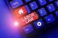 Writing displaying text Labor Law. Concept meaning rules relating to rights and responsibilities of workers Royalty Free Stock Photo