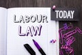 Handwriting text Labour Law. Concept meaning Employment Rules Worker Rights Obligations Legislation Union written on Notebook Book Royalty Free Stock Photo