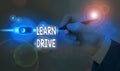 Handwriting text Learn Drive. Concept meaning to gain the knowledge or skill in driving a motor vehicle