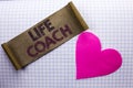 Handwriting text Life Coach. Concept meaning Mentoring Guiding Career Guidance Encourage Trainer Mentor written on Cardboard Piece