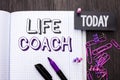 Handwriting text Life Coach. Concept meaning Mentoring Guiding Career Guidance Encourage Trainer Mentor written on Notebook Book o Royalty Free Stock Photo