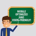 Handwriting text Mobile Optimized And User Friendly. Concept meaning Modern web online internet services Man Standing Holding