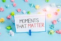 Handwriting text Moments That Matter. Concept meaning Meaningful positive happy memorable important times Colored crumpled papers Royalty Free Stock Photo