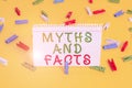 Handwriting text Myths And Facts. Concept meaning Oppositive concept about modern and ancient period Colored clothespin