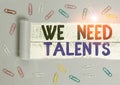 Handwriting text We Need Talents. Concept meaning seeking for creative recruiters to join company or team Paper clip and