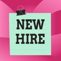 Handwriting text New Hire. Concept meaning someone who has not previously been employed by the organization Paper lines