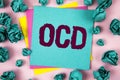 Handwriting text Ocd. Concept meaning Obsessive Compulsive Disorder Psychological Illness Medical Condition written on Sticky Note