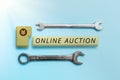 Handwriting text Online Auction. Word Written on digitized sale event which item is sold to the highest bidder