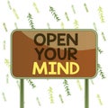 Handwriting text Open Your Mind. Concept meaning Be openminded Accept new different things ideas situations Board ground Royalty Free Stock Photo