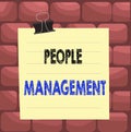 Handwriting text People Management. Concept meaning process of unlocking and channelling employees potential Paper lines binder