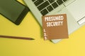 Handwriting text Presumed Security. Concept meaning system safe from attack due to attacker assume its safe Trendy laptop Royalty Free Stock Photo