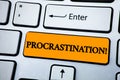 Handwriting text Procrastination Motivational Call. Concept meaning Delay or Postpone something boring written on Orange Key Butto