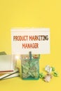 Handwriting text Product Marketing Manager. Concept meaning who responsible for putting plan to sell product Trash bin Royalty Free Stock Photo