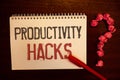 Handwriting text Productivity Hacks. Concept meaning Hacking Solution Method Tips Efficiency Productivity Reddish paper balls stru