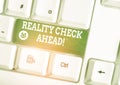 Handwriting text Reality Check Ahead. Concept meaning makes them recognize truth about situations or difficulties White Royalty Free Stock Photo