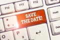 Handwriting text Save The Date. Concept meaning remember not schedule anything else on this day White pc keyboard with Royalty Free Stock Photo