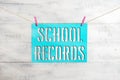 Handwriting text School Records. Concept meaning Information that is kept about a child at school Biography Clothesline clothespin Royalty Free Stock Photo