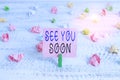 Handwriting text See You Soon. Concept meaning used for saying goodbye to someone and going to meet again soon Green clothespin Royalty Free Stock Photo