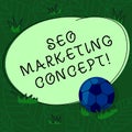 Handwriting text Seo Marketing Concept. Concept meaning Strategy that implement to satisfy customers need Soccer Ball on