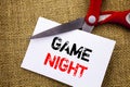 Handwriting text showing Game Night. Conceptual photo Entertainment Fun Play Time Event For Gaming written on Sticky Note Paper Cu Royalty Free Stock Photo
