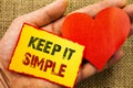 Handwriting text showing Keep It Simple. Business concept for Simplicity Easy Strategy Approach Principle written on Sticky Note P Royalty Free Stock Photo