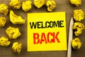 Handwriting text showing Welcome Back. Business concept for Emotion Greeting written on sticky note paper on the vintage backgroun Royalty Free Stock Photo