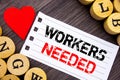 Handwriting text showing Workers Needed. Conceptual photo Search For Career Resources Employees Unemployment Problem written on te