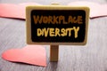 Handwriting text showing Workplace Diversity. Business photo showcasing Corporate Culture Global Concept For Disability written on Royalty Free Stock Photo