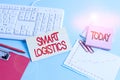 Handwriting text Smart Logistics. Concept meaning integration of intelligent technology in logistics system Paper blue desk