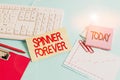 Handwriting text Spinner Forever. Concept meaning stress reliever for showing who tend to fidget Flat top Paper blue desk computer