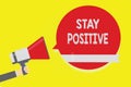 Handwriting text Stay Positive. Concept meaning Engage in Uplifting Thoughts Be Optimistic and Real Man holding megaphone loudspea