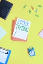 Handwriting text Stock Trading. Concept meaning Buy and Sell of Securities Electronically on the Exchange Floor Paper Royalty Free Stock Photo