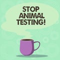 Handwriting text Stop Animal Testing. Concept meaning scientific experiment which live animal forced undergo Mug photo