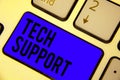 Handwriting text Tech Support. Concept meaning Assisting individuals who are having technical problems Keyboard blue key Intention Royalty Free Stock Photo