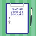Handwriting text Training Courses And Seminars. Concept meaning Education professional learning improvement Blank Sheet Royalty Free Stock Photo