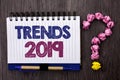 Handwriting text Trends 2019. Concept meaning Current Movement Latest Branding New Concept Prediction written on Notebook Book on