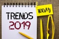 Handwriting text Trends 2019. Concept meaning Current Movement Latest Branding New Concept Prediction written on Notebook Book on Royalty Free Stock Photo
