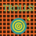 Handwriting text Trolls. Concept meaning Online troublemakers posting provocative inflammatory messages Color Dart Board