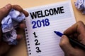 Handwriting text Welcome 2018. Concept meaning Celebration New Celebrate Future Wishes Gratifying Wish written by Man on Notebook