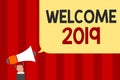 Handwriting text Welcome 2019. Concept meaning New Year Celebration Motivation to Start Cheers Congratulations Man holding megapho